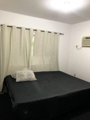 Quarto econômico 50 metros da praia